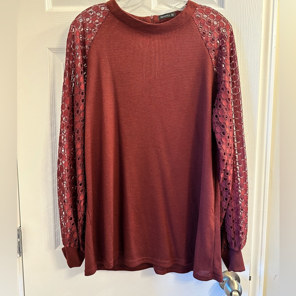 Burgundy sweater with lace sleeves